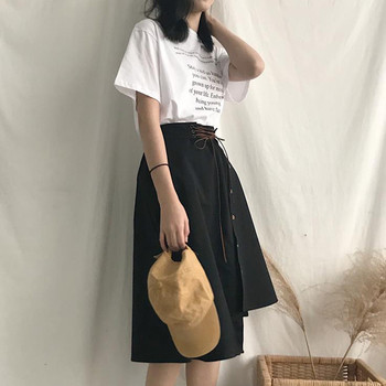 Κομψή γυναικεία φούστα με ασύμμετρο μήκος και διακοσμητικά κουμπιά σε δύο χρώματα