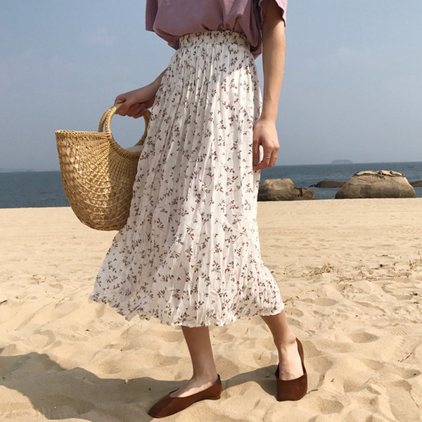 Καθημερινή γυναικεία φούστα  με υψηλή μέση και floral μοτίβο σε μαύρο και καφέ χρώμα