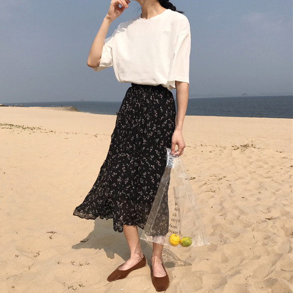 Καθημερινή γυναικεία φούστα  με υψηλή μέση και floral μοτίβο σε μαύρο και καφέ χρώμα