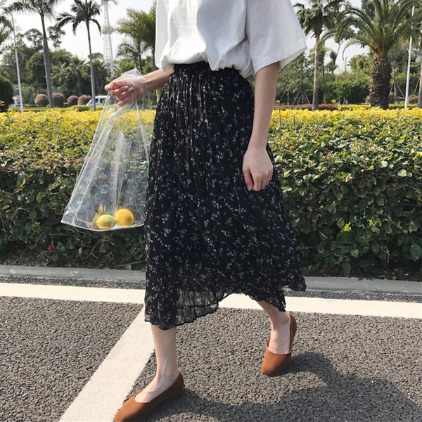 Καθημερινή γυναικεία φούστα  με υψηλή μέση και floral μοτίβο σε μαύρο και καφέ χρώμα