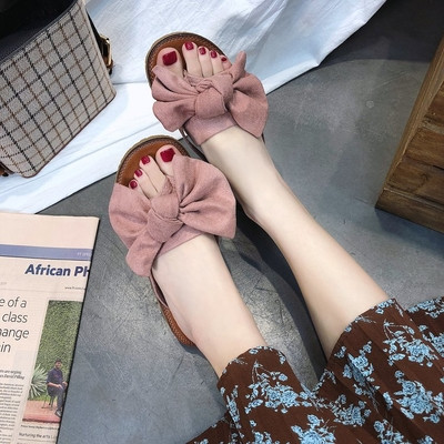 Γυναικείες παντόφλες με επίπεδη σόλα και κορδέλα σε διάφορα χρώματα