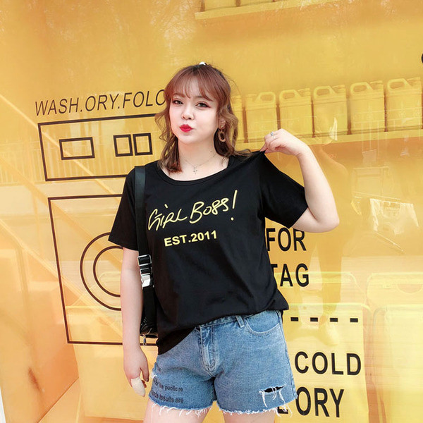 Bluză de damă în mărimi MAXI în alb și negru cu aplicație