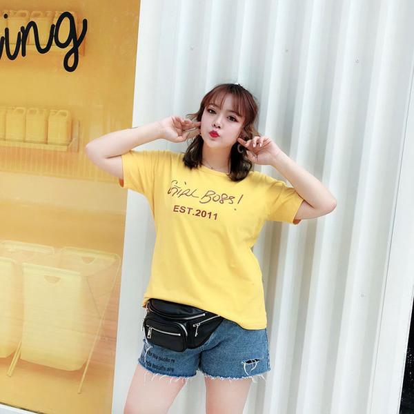 Bluză de damă în mărimi MAXI în alb și negru cu aplicație