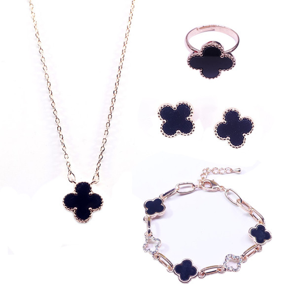 Γυναικείο σετ σε τρία μέρη σε διάφορα σχέδια - σκουλαρίκια, κολιέ και βραχιόλι