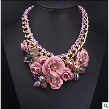 Women`s necklace with large floral elements and stones