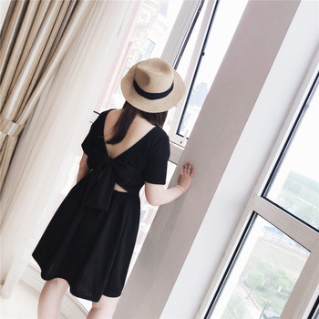 Γυναικείο φόρεμα μέγεθος MAXI σε μαύρο χρώμα με εντυπωσιακή πλάτη