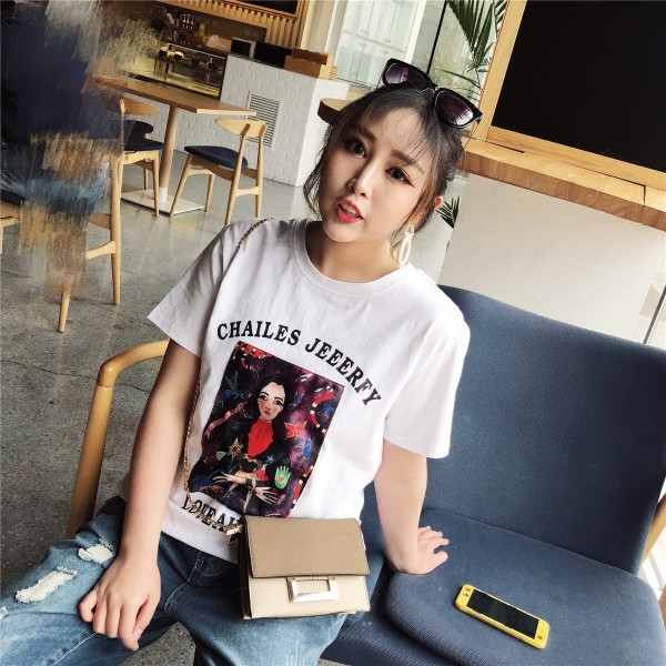 Γυναικεία T-shirt MAXI μέγεθος σε λευκό με εφαρμογή