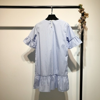 Μοντέρνο γυναικείο φόρεμα σε μπλε χρώμα με κεντήματα