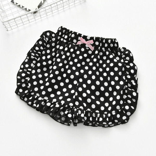 Pantaloni scurți pentru fete pentru copii cu o panglică cu puncte