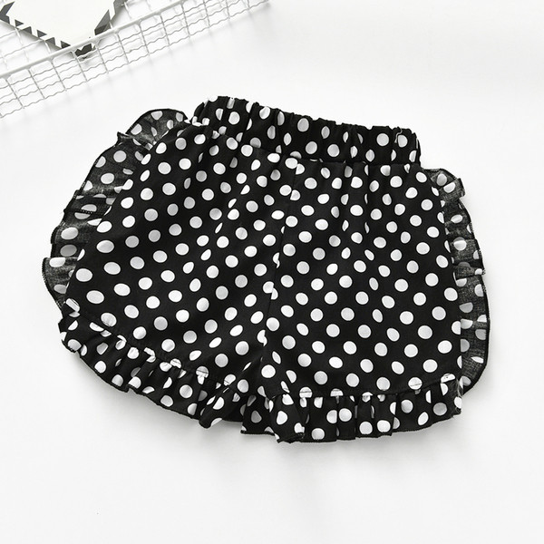 Pantaloni scurți pentru fete pentru copii cu o panglică cu puncte