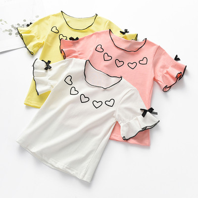 Children`s blouse with short sleeves for girls with applique in white, pink and yellow