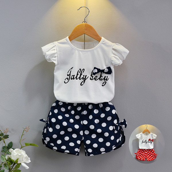 Set copii din doua piese pentru fete in puncte cu panglica in doua culori