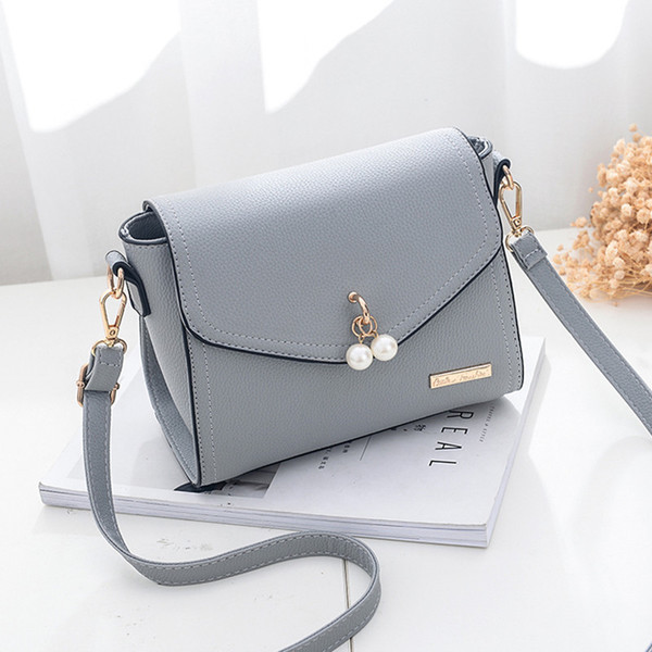 Geanta de dama eleganta cu perle decorative in mai multe culori