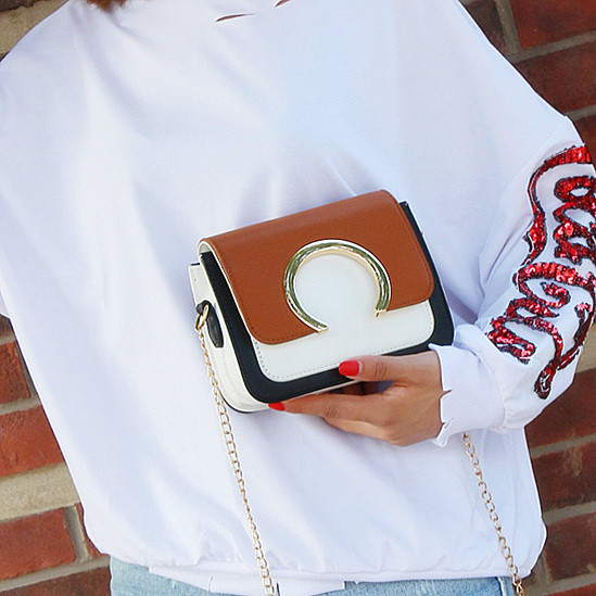 Stílusos mini kézitáska fém díszítéssel több színben