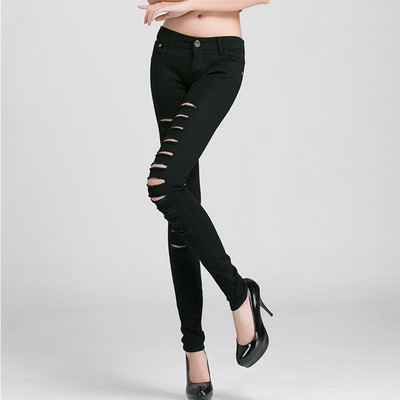 Women`s elastic jeans with torn motifs in two colors