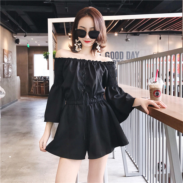 Κομψή γυναικεία σαλοπέτα με πεσμένους ώμους σε κόκκινο και μαύρο χρώμα