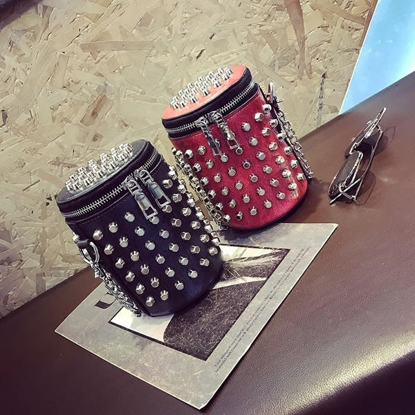 Geanta mini dama in doua culori cu ochiuri metalice