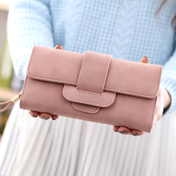 Γυναικείο πορτοφόλι σε διάφορα χρώματα με μεγάλο συνδετήρα