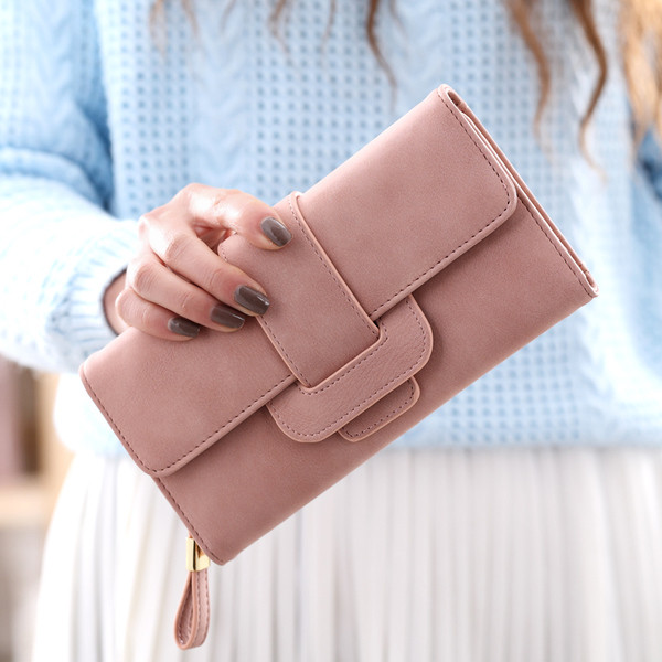 Γυναικείο πορτοφόλι σε διάφορα χρώματα με μεγάλο συνδετήρα