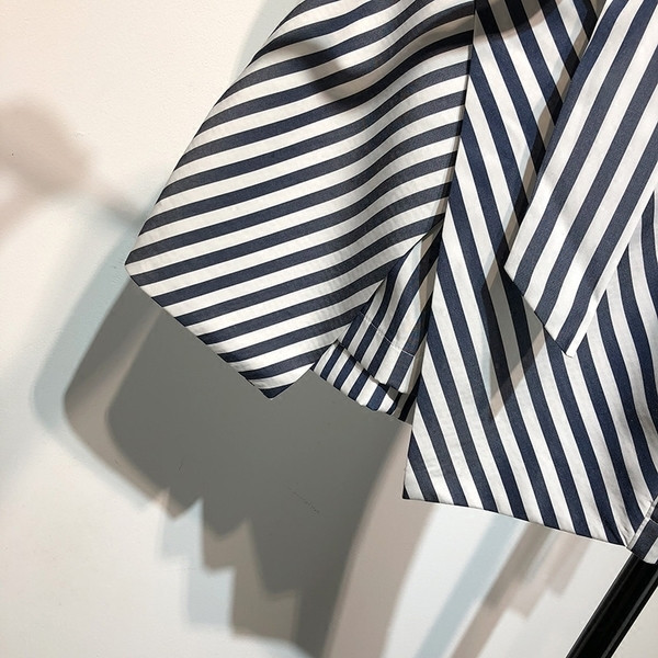 Fusta de damă în dungi, elegantă, cu curea și lungime asimetrică