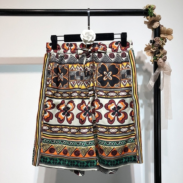 Pantaloni de dama de vara intr-un model larg cu motive colorate