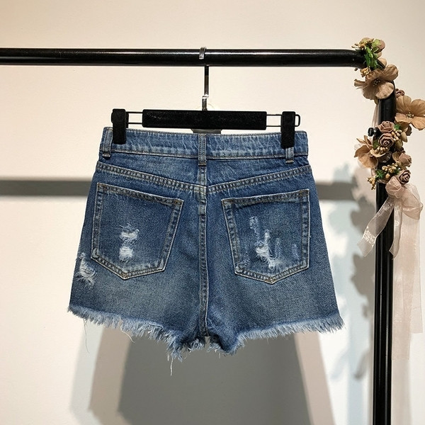 Pantaloni scurti din denim de dama cu talie inalta si rupti