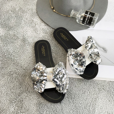 Γυναικείες παντόφλες με επίπεδη σόλα με κορδέλες πούλιες σε διαφορετικά χρώματα