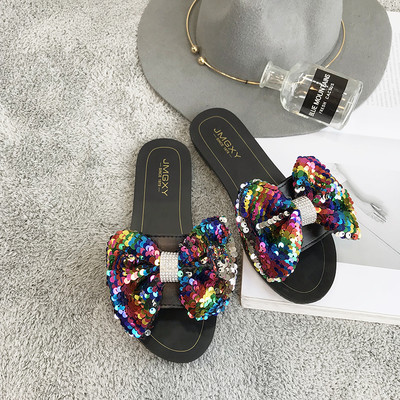 Γυναικείες παντόφλες με επίπεδη σόλα με κορδέλες πούλιες σε διαφορετικά χρώματα