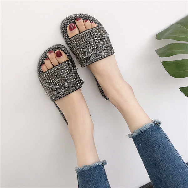 Papuci eleganti de dama cu talpa plata si decorati cu mini pietre si panglica