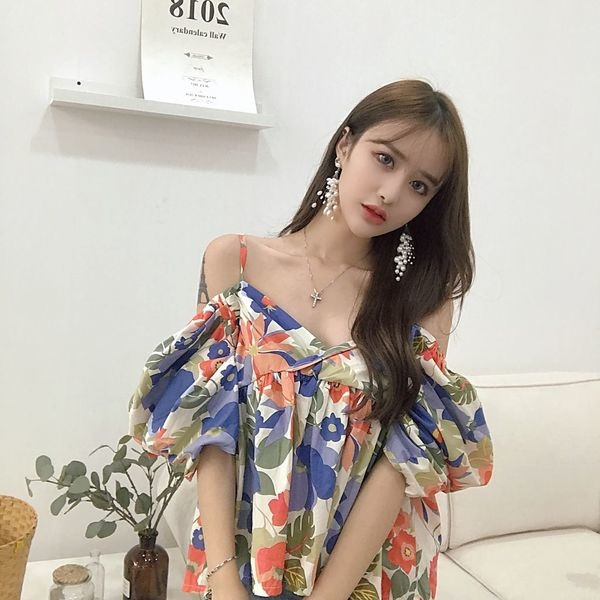 Γυναικεία καλοκαιρινή μπλούζα με κορδόνια σε μοτίβα λουλουδιών