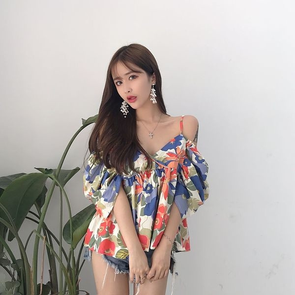 Γυναικεία καλοκαιρινή μπλούζα με κορδόνια σε μοτίβα λουλουδιών