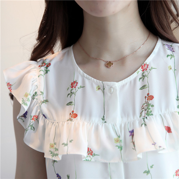 Λευκό γυναικείο πουκάμισο με φυτικά κίνητρα