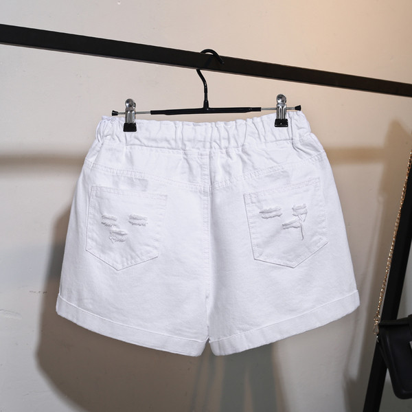 Női MAXI méretű rövidnadrág elasztikus derékkal és fűzős fehér színben - szakadt