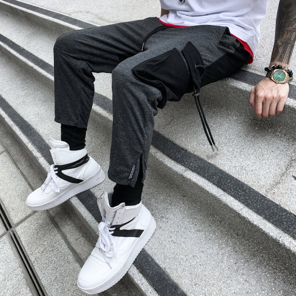 Ανδρική αθλητική φόρμα με πλαϊνές τσέπες και γραβάτες