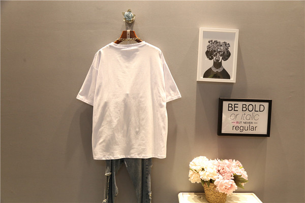 Μοντέρνο γυναικείο T-shirt MAXI σε μαύρο και άσπρο με εφαρμογή κατάλληλο για καθημερινή ζωή