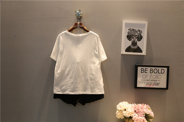 Κομψή γυναικεία μπλούζα  ΜΑΧΙ σε μαύρο και άσπρο χρώμα