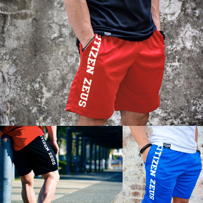 Men`s short sports shorts in several colors with an inscription