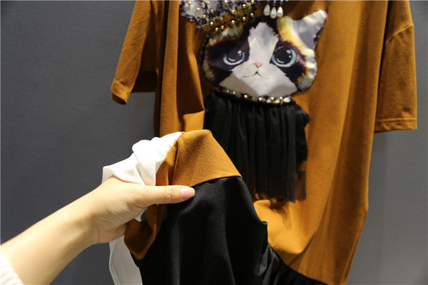 Κομψό γυναικείο μπλουζοφόρεμα  μεγέθους MAXI - ενδιαφέρον μοντέλο με εφαρμογή