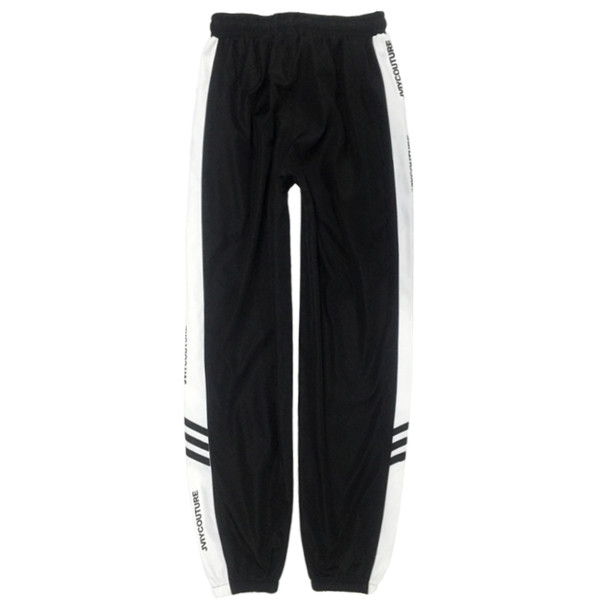 Анцуг широк модел за мъже и жени в три цвята с цветен кант