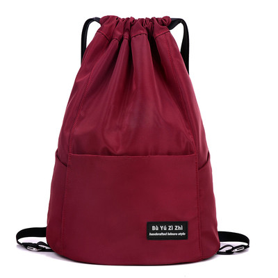 Γυναικείο σακίδιο με πλαϊνές τσέπες