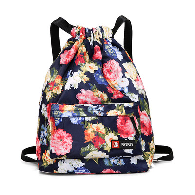 Γυναικείο σακίδιο με πολύχρωμα εκτυπώσιμα και φυτικά μοτίβα