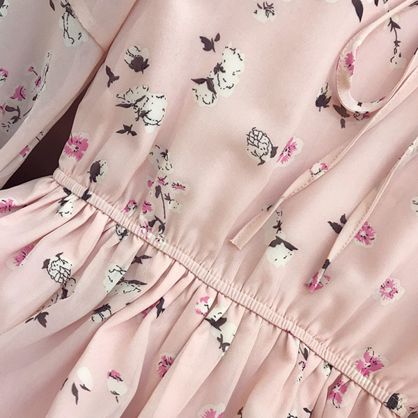 Κομψό γυναικείο φόρεμα σε ροζ και μαύρο χρώμα με floral μοτίβα