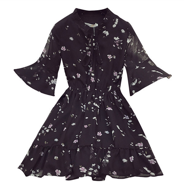 Κομψό γυναικείο φόρεμα σε ροζ και μαύρο χρώμα με floral μοτίβα