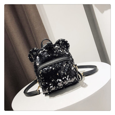 Γυναικεία σακίδιο με τρισδιάστατα στοιχεία και πούλιες