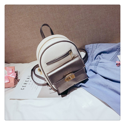 Γυναικείο σακίδιο σε διάφορα χρώματα με μεταλλικά στοιχεία