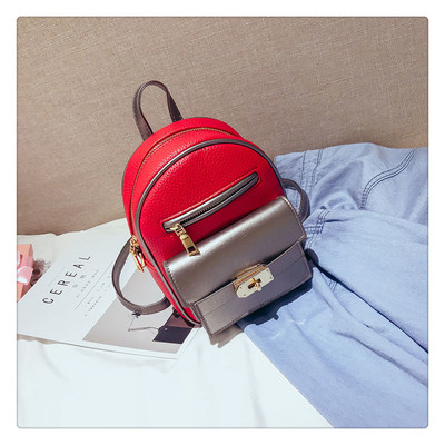 Γυναικείο σακίδιο σε διάφορα χρώματα με μεταλλικά στοιχεία