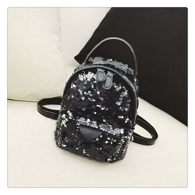 Γυναικείο σύγχρονο μικρό σακίδιο με πούλιες και οικολογικά δερμάτινα στοιχεία