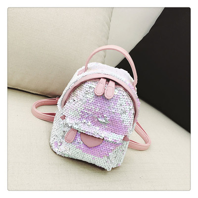 Γυναικείο σύγχρονο μικρό σακίδιο με πούλιες και οικολογικά δερμάτινα στοιχεία