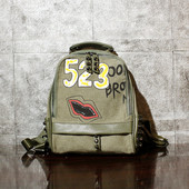 Γυναικείο σύγχρονο σακίδιο με ύφασμα και μεταλλικά στοιχεία