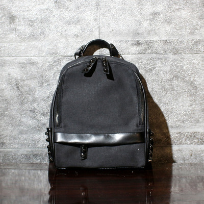 Γυναικείο σύγχρονο σακίδιο με ύφασμα και μεταλλικά στοιχεία